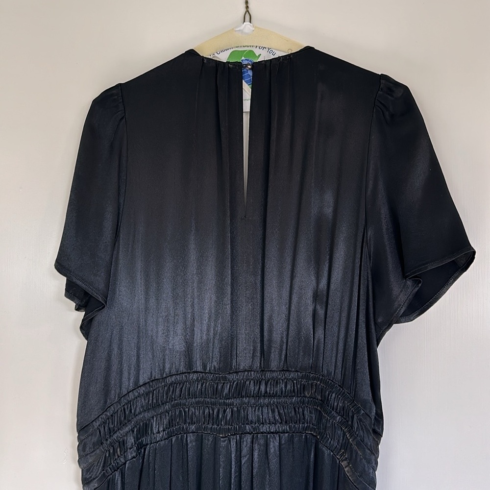 Wide leg Anthropologie jumpsuit with pockets in large. Great condition.